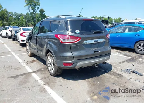 2016 Ford Escape Titanium z USA, uszkodzony, nr VIN 1FMCU9J95GUB57721